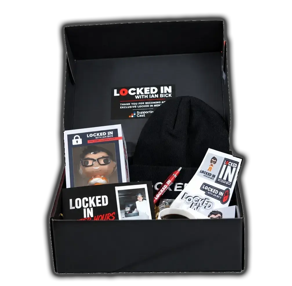 Locked In membership welcome box with a bobblehead, beanie, stickers, mug, and more exclusive merch
